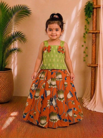 (CTS011)Traditional lotus and Pichwai-inspired orange and green Lehenga set.