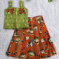 (CTS011)Traditional lotus and Pichwai-inspired orange and green Lehenga set.