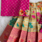 (ETTS032) Traditional magenta and cream brocade flared pattu pavadai  set.