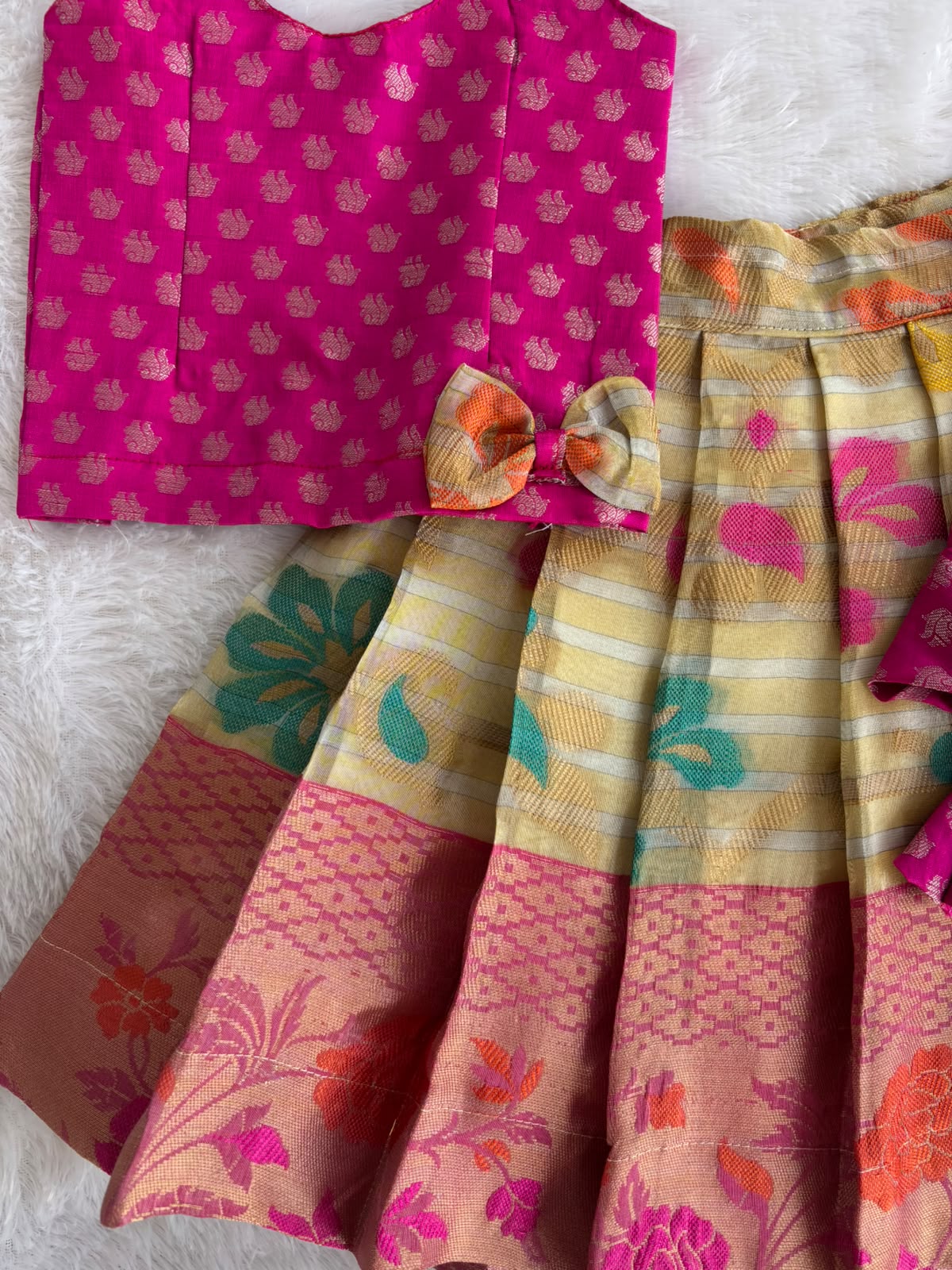 (ETTS032) Traditional magenta and cream brocade flared pattu pavadai  set.