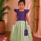 (ETTS042) Vibrant Purple &Sage Green Traditional Pattu Pavadai Set